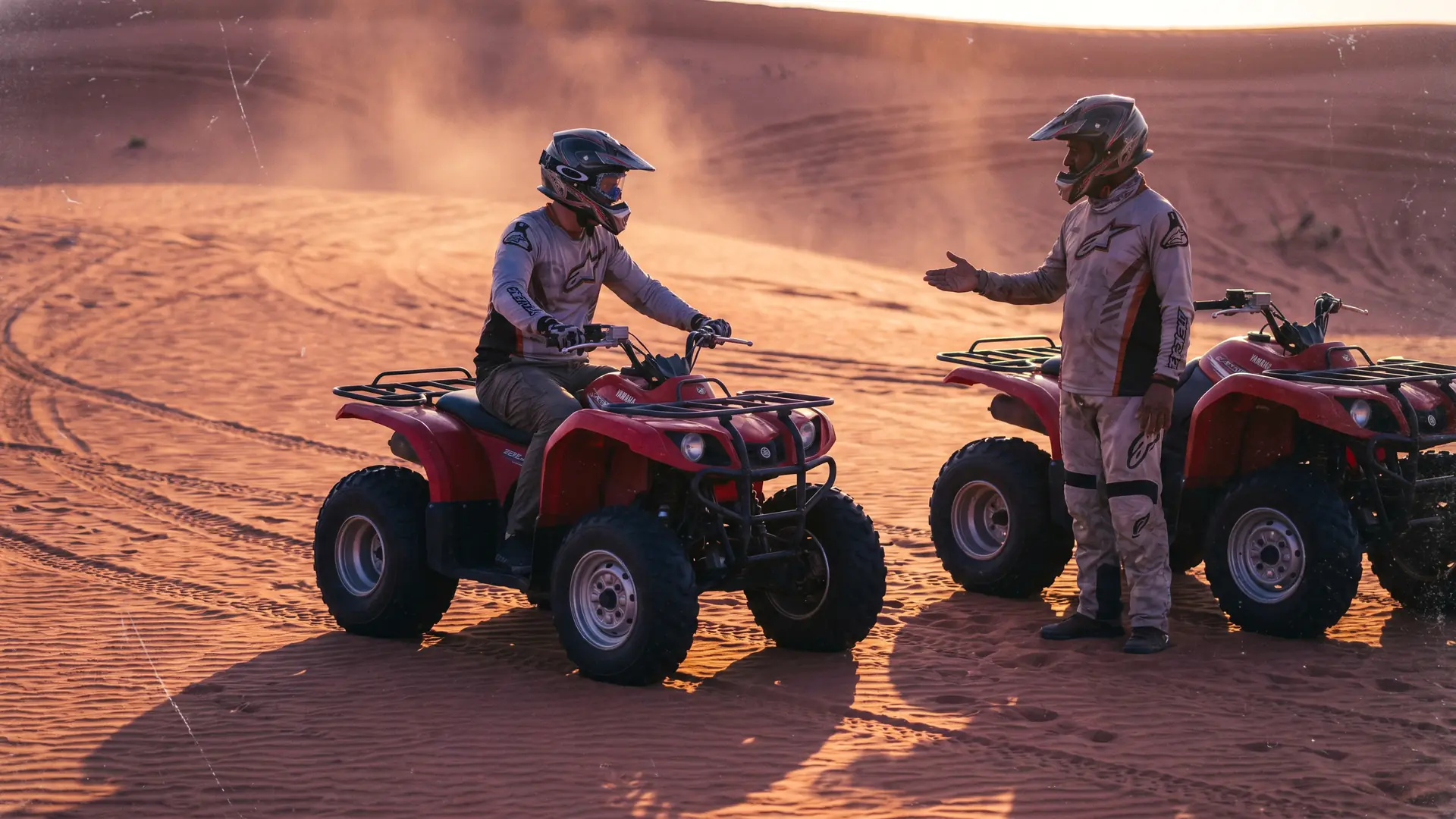 Beginner riders on Yamaha ATVs during a guided desert tour in Dubai